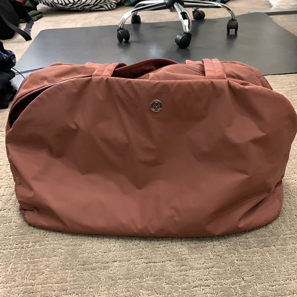Lululemon tennis bag, Mauve, a few ink stains as pictured
